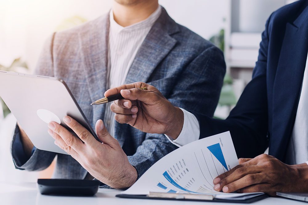 Professionals reviewing financial documents