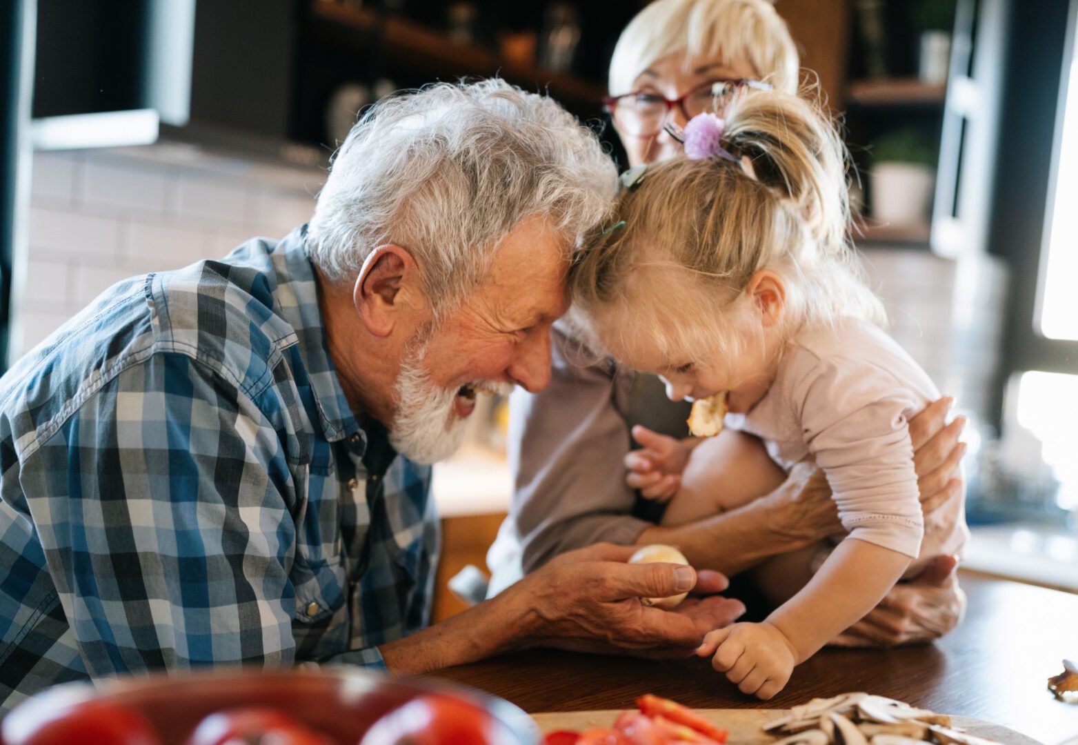 Elderly man and child sharing moment