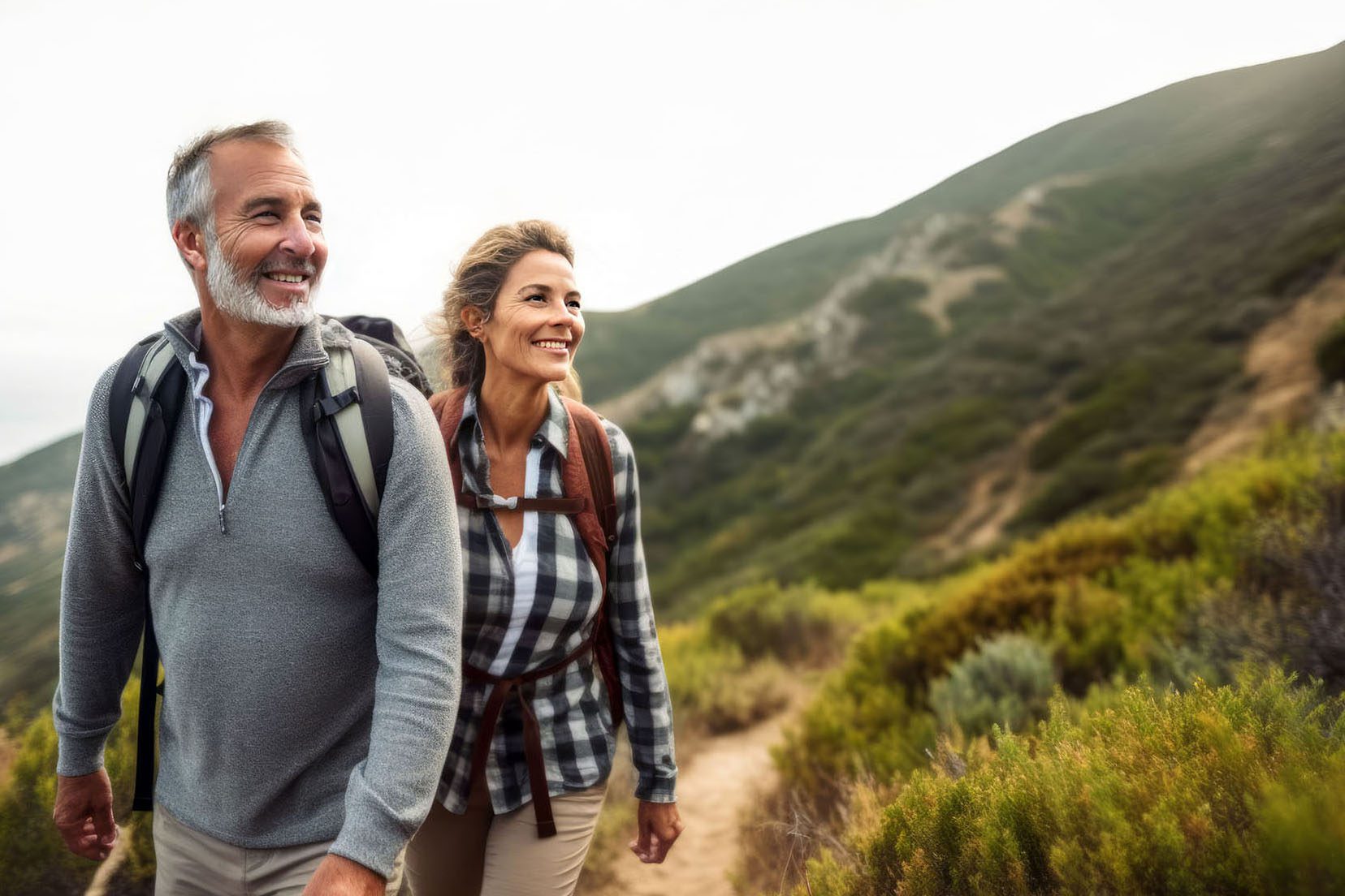 Smiling couple enjoying a scenic hike